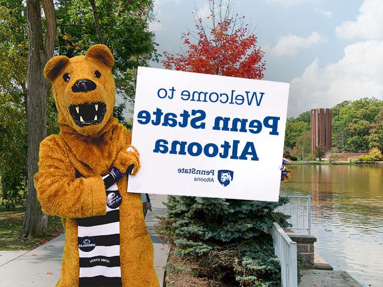 The Nittany Lion mascot holding up a sign reading Welcome to <a href='http://mamq0.goudounet.com'>十大网投平台信誉排行榜</a>阿尔图纳分校